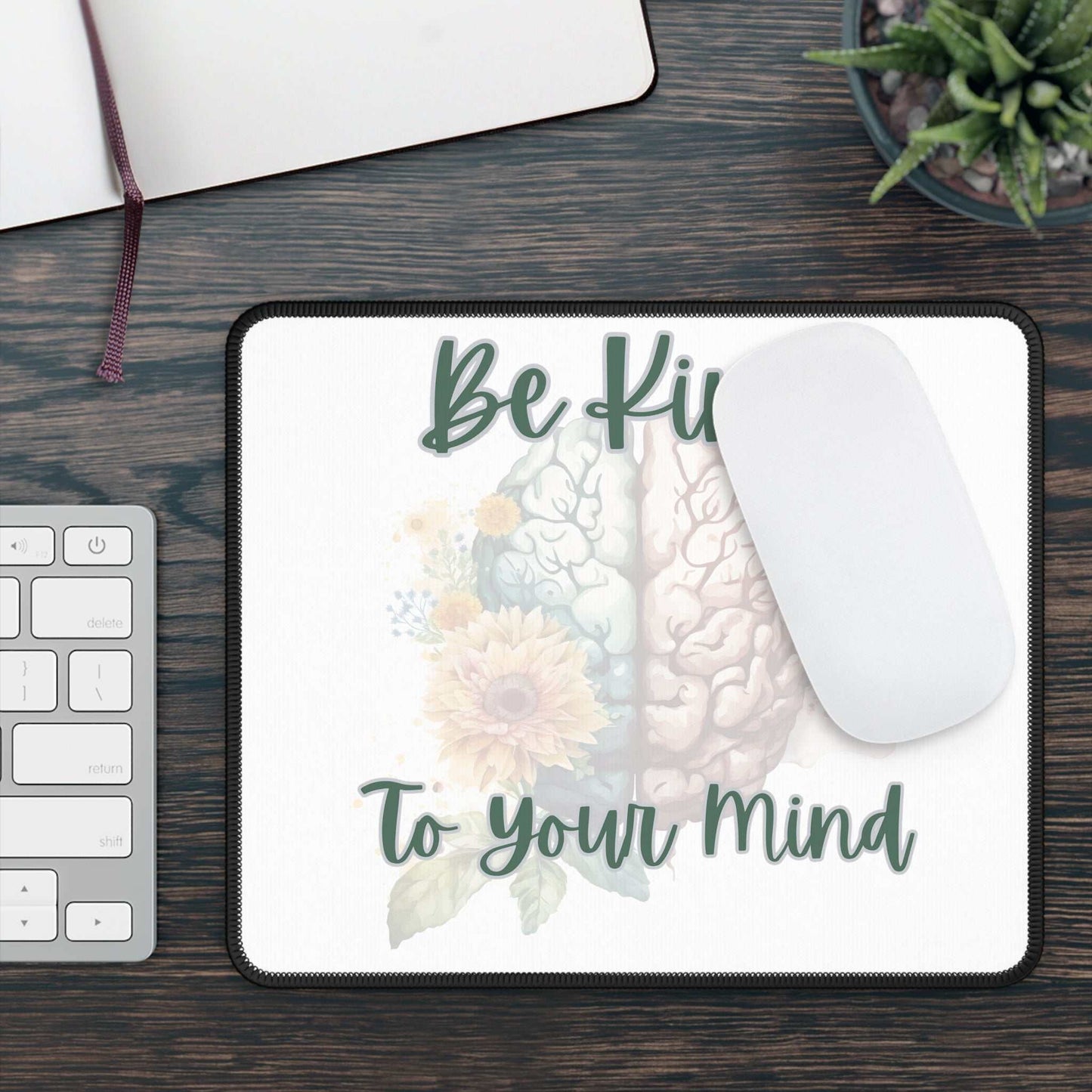 Mental Health Matters gaming mouse pad with "Be Kind To Your Mind" message on desk setup.