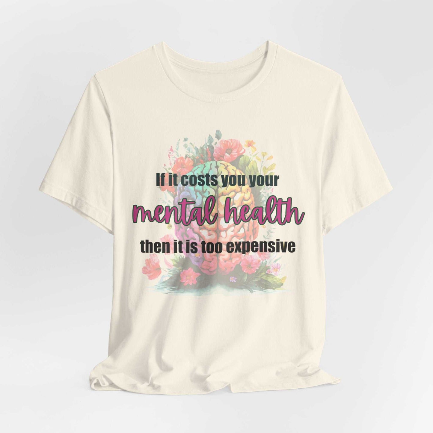 White T-shirt with floral design and "If it costs you your mental health, then it is too expensive" slogan.