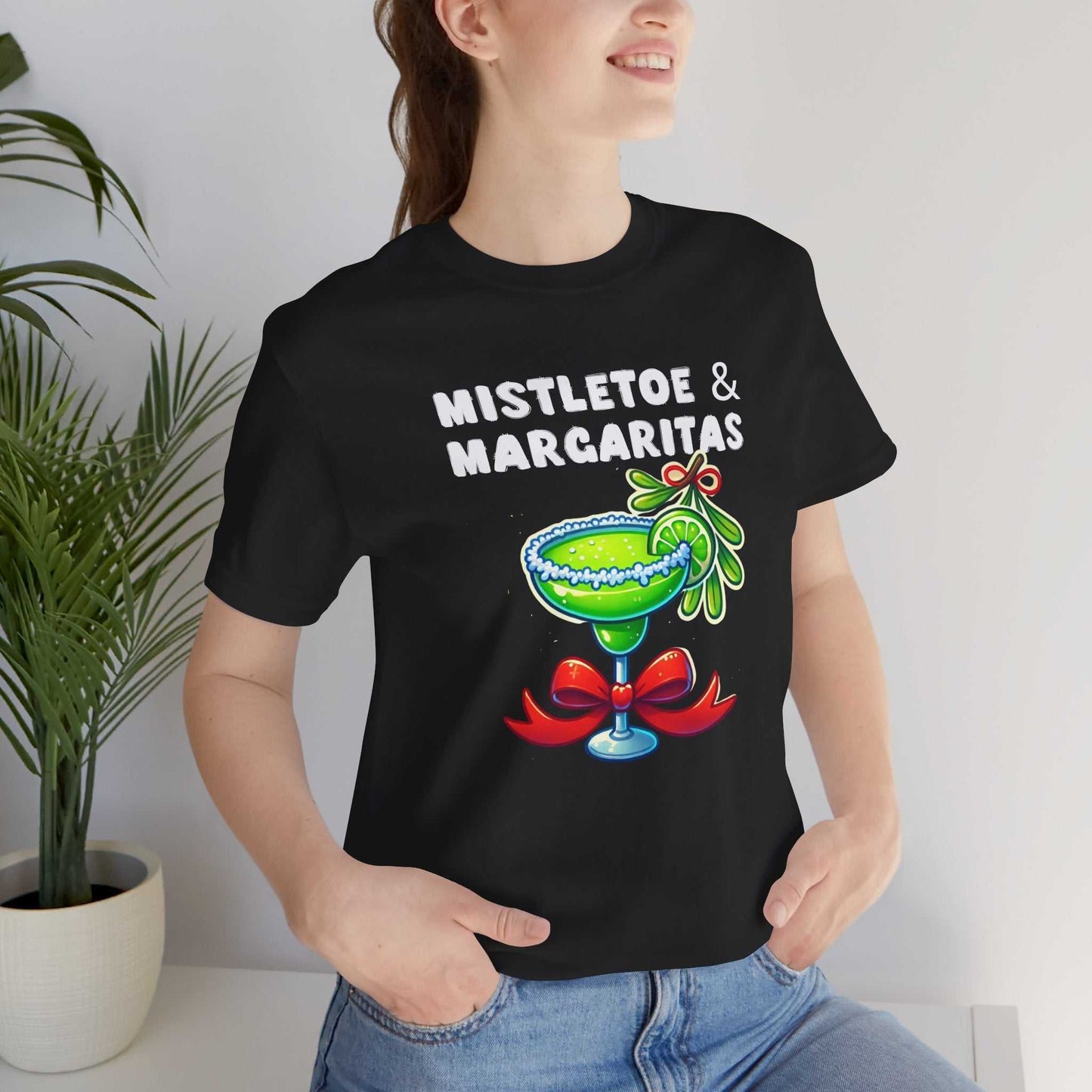 Black Mistletoe and Margaritas festive holiday t-shirt with margarita glass and mistletoe graphic.