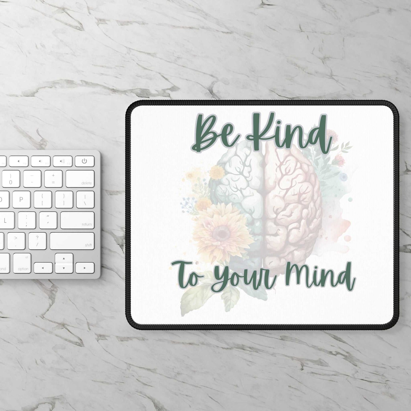 Mental Health Matters gaming mouse pad with "Be Kind To Your Mind" message, featuring a brain and floral design, 9x7 inches.