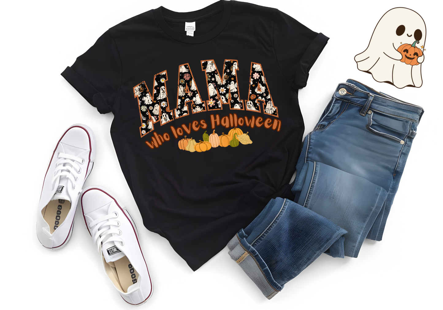 Black "MAMA Who Loves Halloween" fall-themed softstyle shirt with pumpkin graphics, paired with blue jeans and white sneakers.