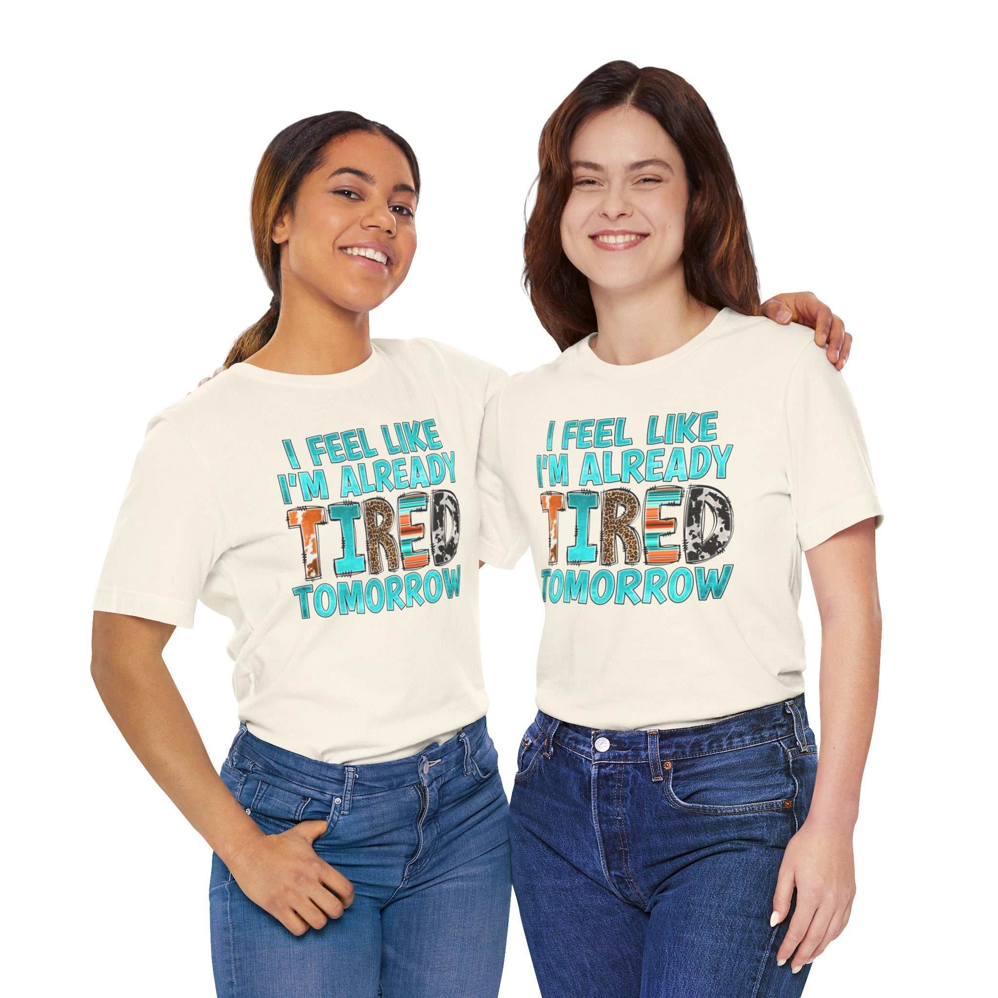 T-shirt featuring "Tired Tomorrow Mental Health Matters" design, two smiling women wearing it.