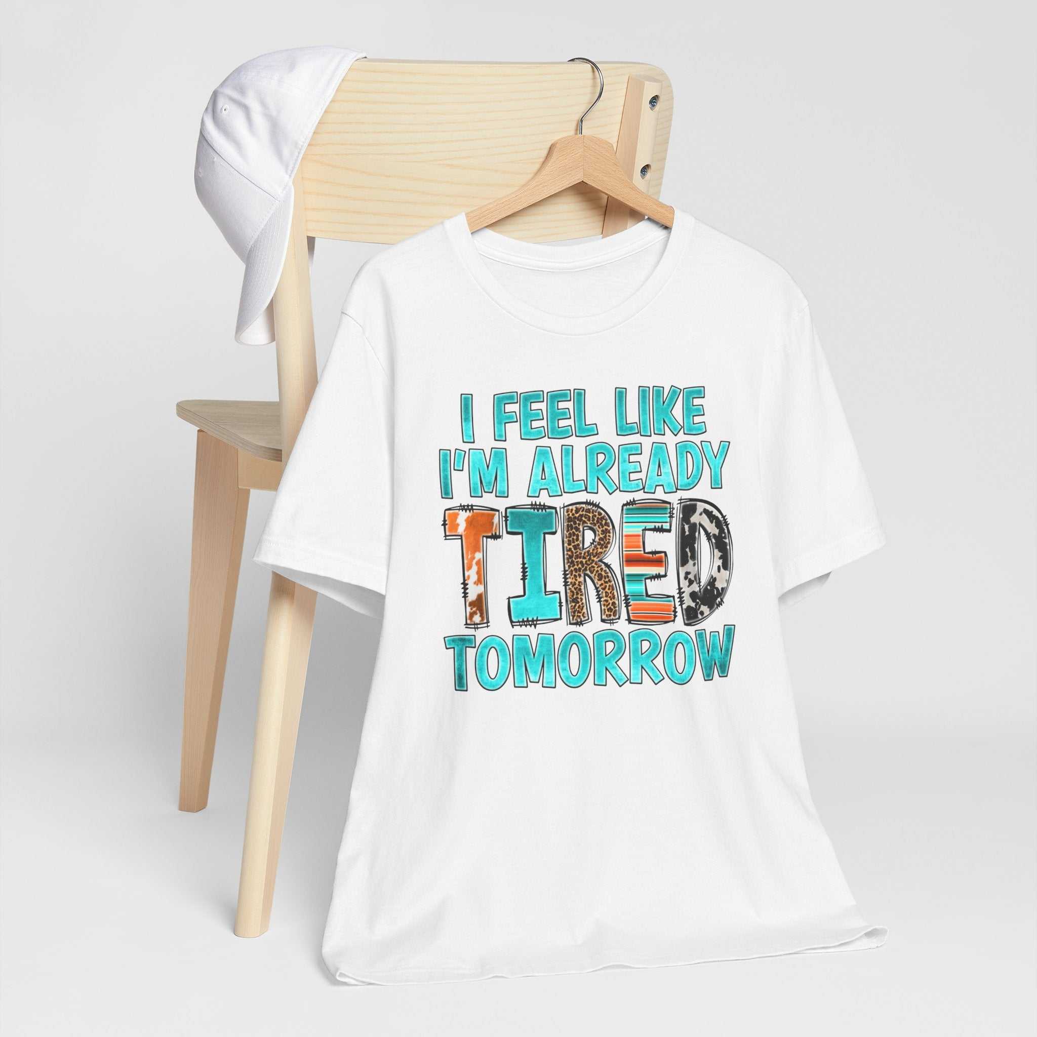 Tired Tomorrow Mental Health Matters t-shirt on a hanger, featuring the phrase "I Feel Like I'm Already Tired Tomorrow".