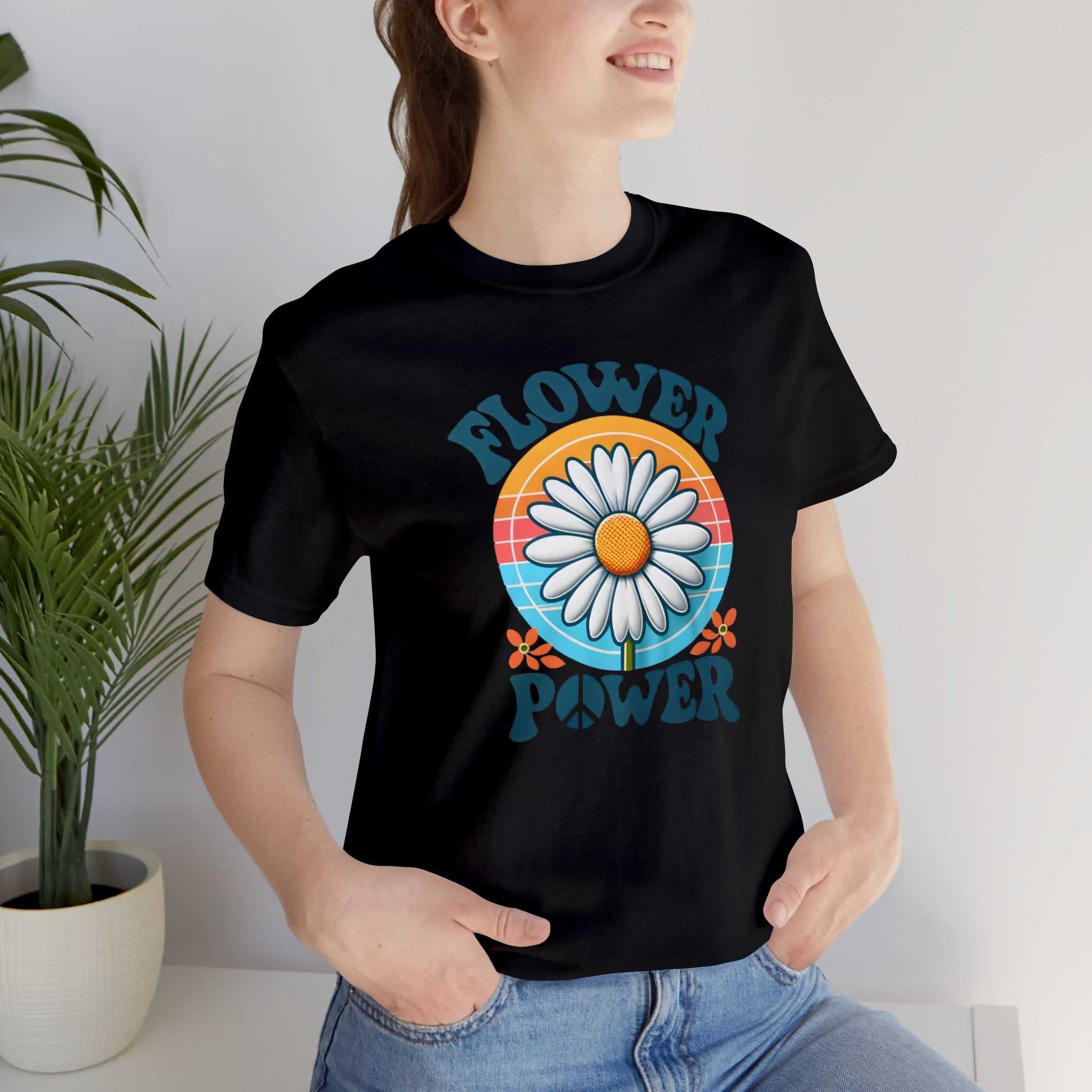 Hippee Flower Power BOHO shirt with vibrant flower graphic, worn by a person.
