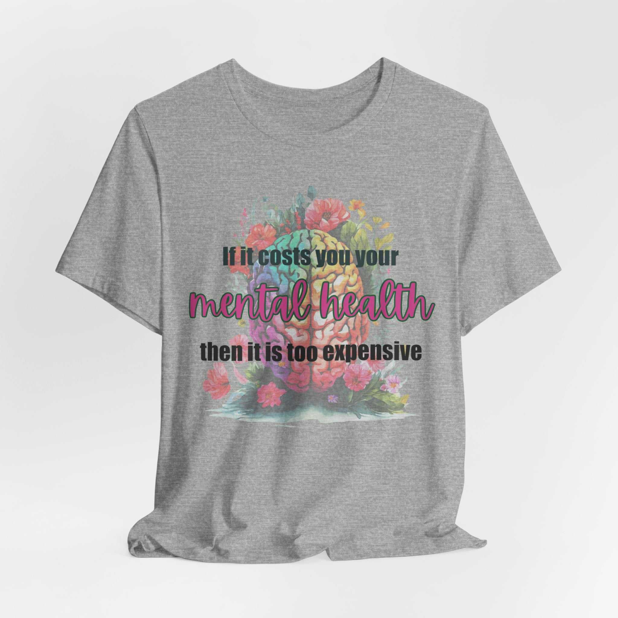 Mental Health Is Inexpensive Affirmation T-Shirt with bold mental health slogan and floral design.