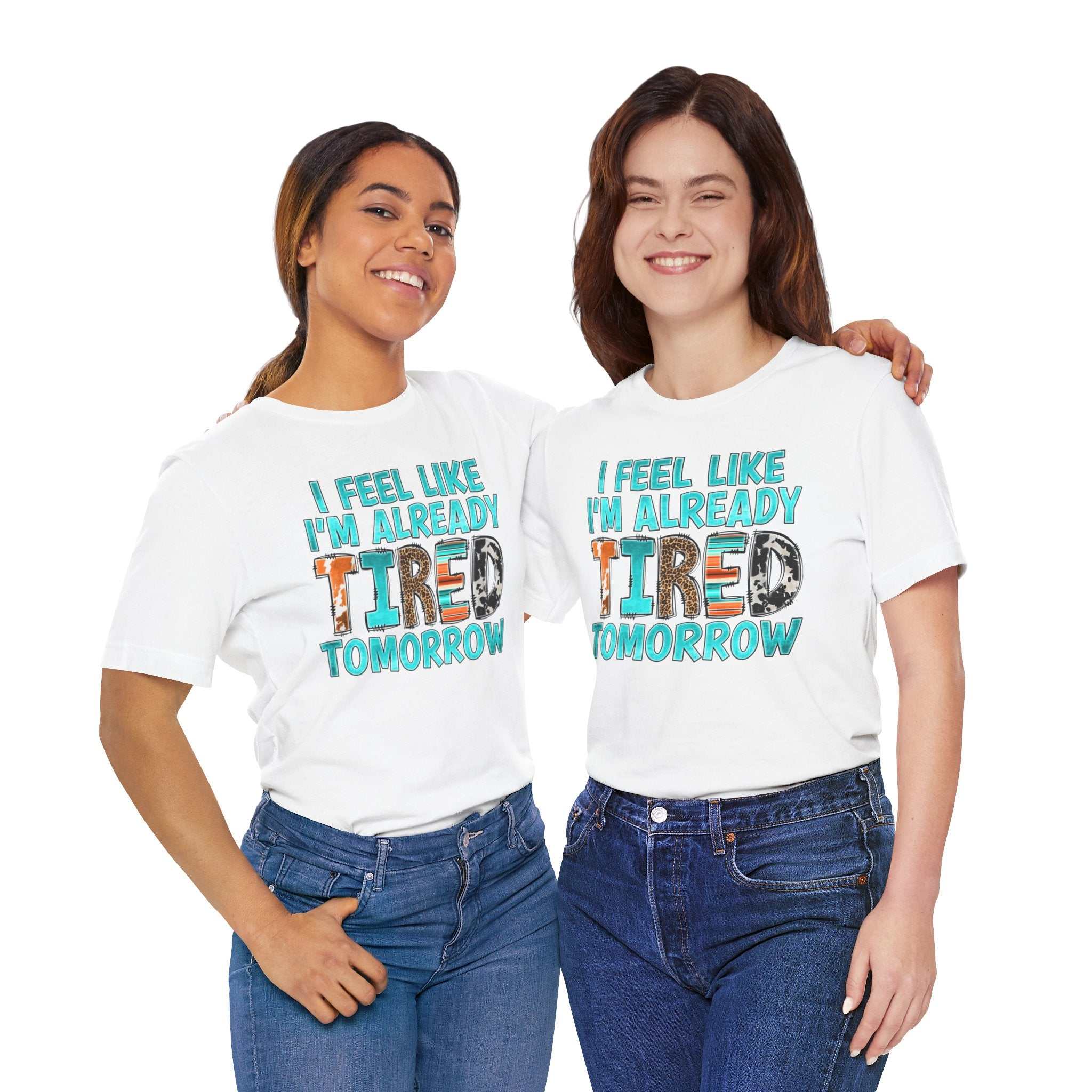 Two women wearing "Tired Tomorrow Mental Health Matters" T-shirts featuring repeated motivational text design.