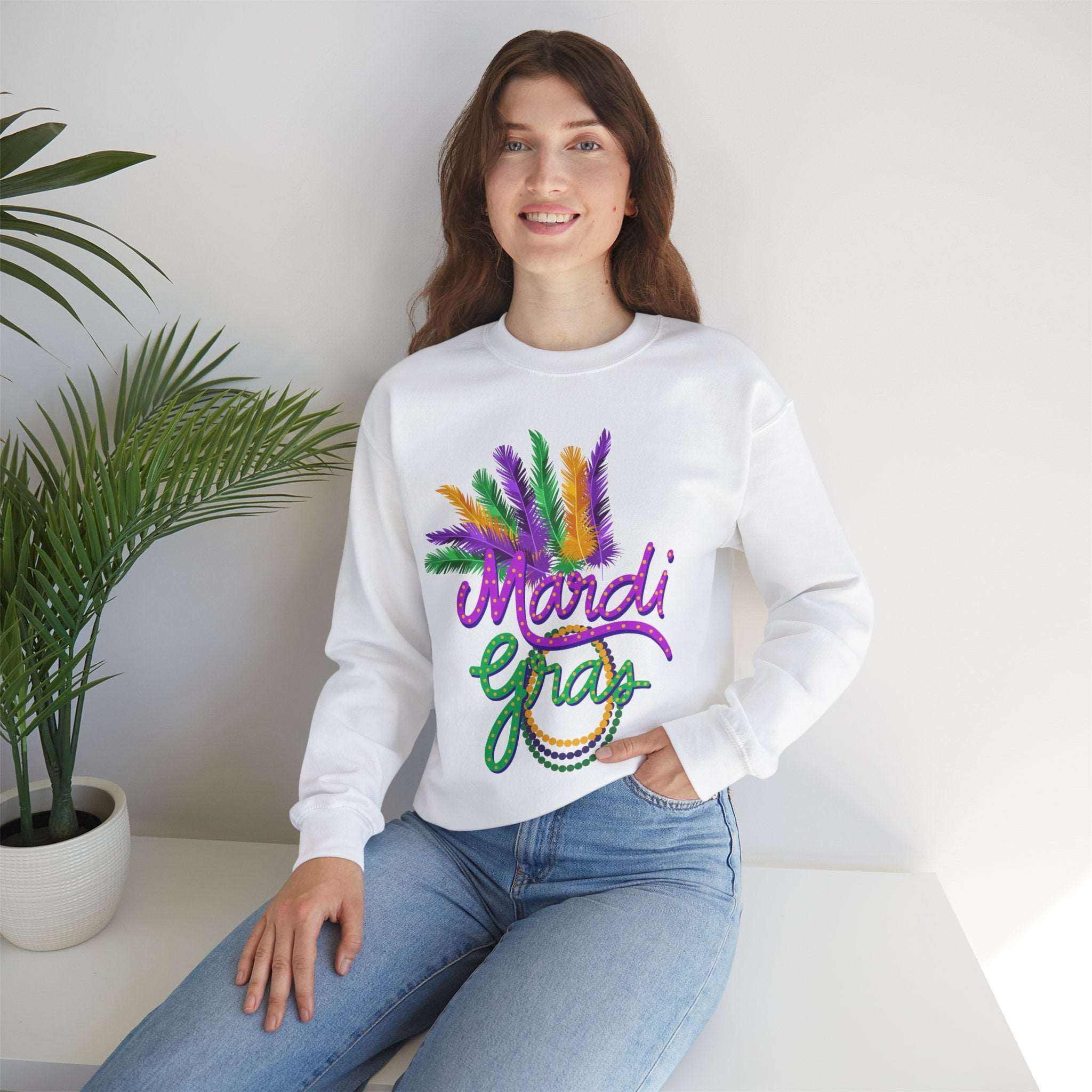Unisex Mardi Gras sweatshirt featuring vibrant colors, beads, and feathers design, perfect for celebrating Mardi Gras in style.