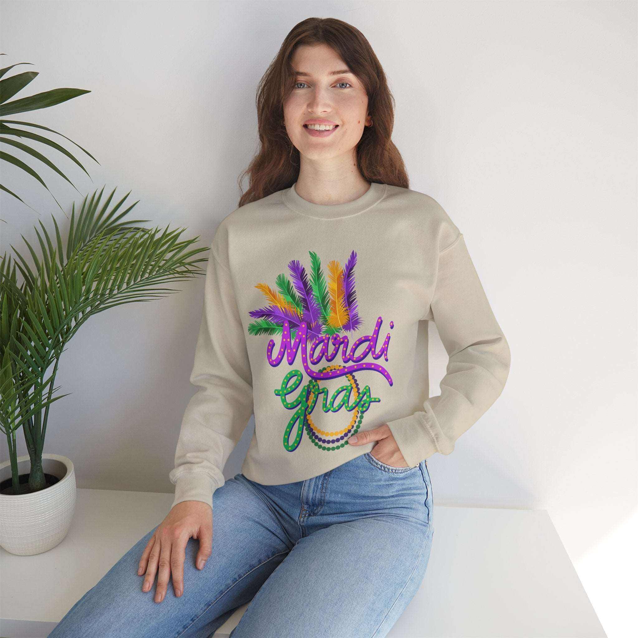 Unisex Mardi Gras sweatshirt with colorful bead and feather design, perfect for February celebrations and festive parties.