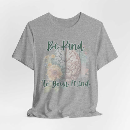 Be Kind To Your Mind T-Shirt featuring brain illustration and floral design promoting mental health awareness.