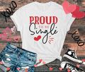 Proud To Be Single T-shirt for women, featuring bold red and black text with heart graphics, paired with distressed jeans and sneakers.