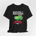 Black unisex t-shirt with festive "Mistletoe & Margaritas" text, featuring a margarita glass decorated with mistletoe and a red bow.