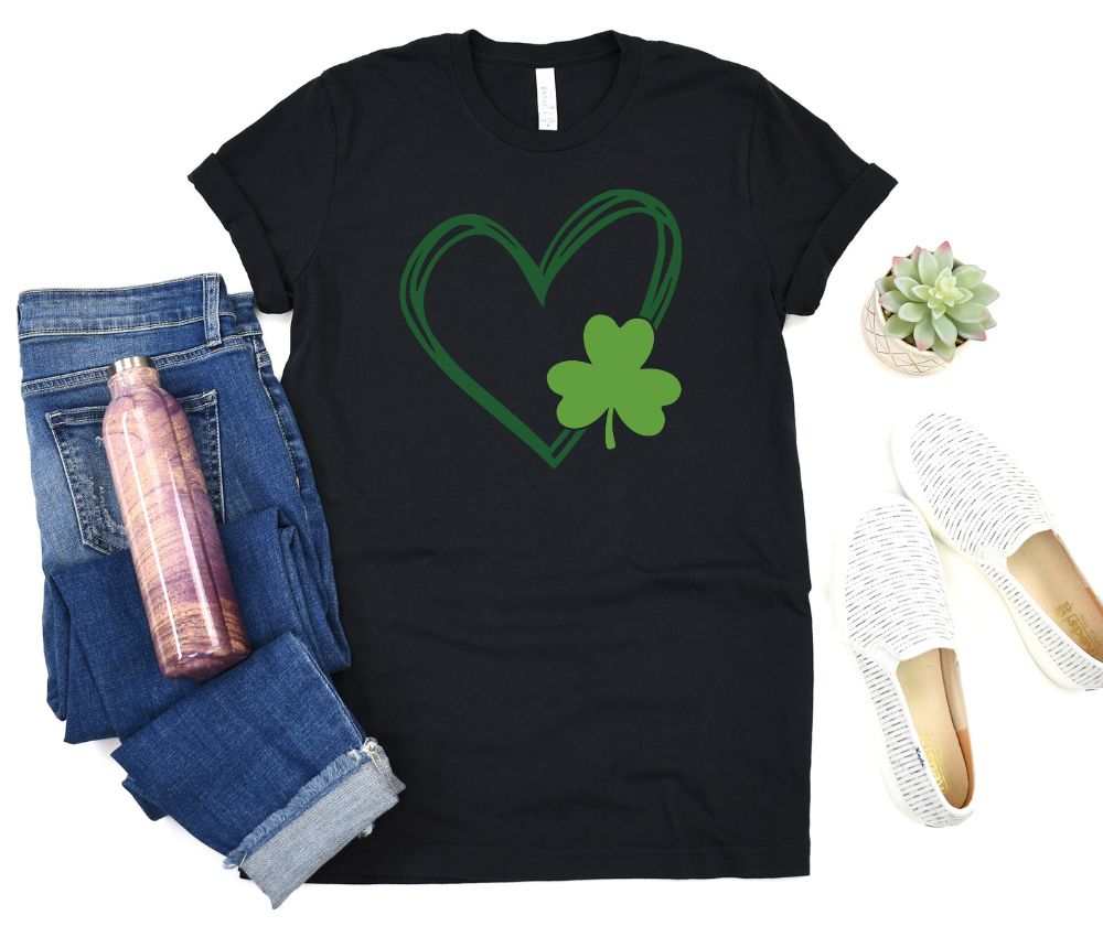 St Patrick's Day shirt with heart and shamrock design on black fabric.