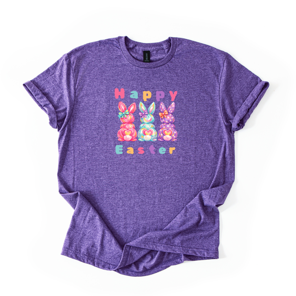 Happy Easter Bunny pastel shirt with three colorful candy-inspired bunnies on softstyle fabric