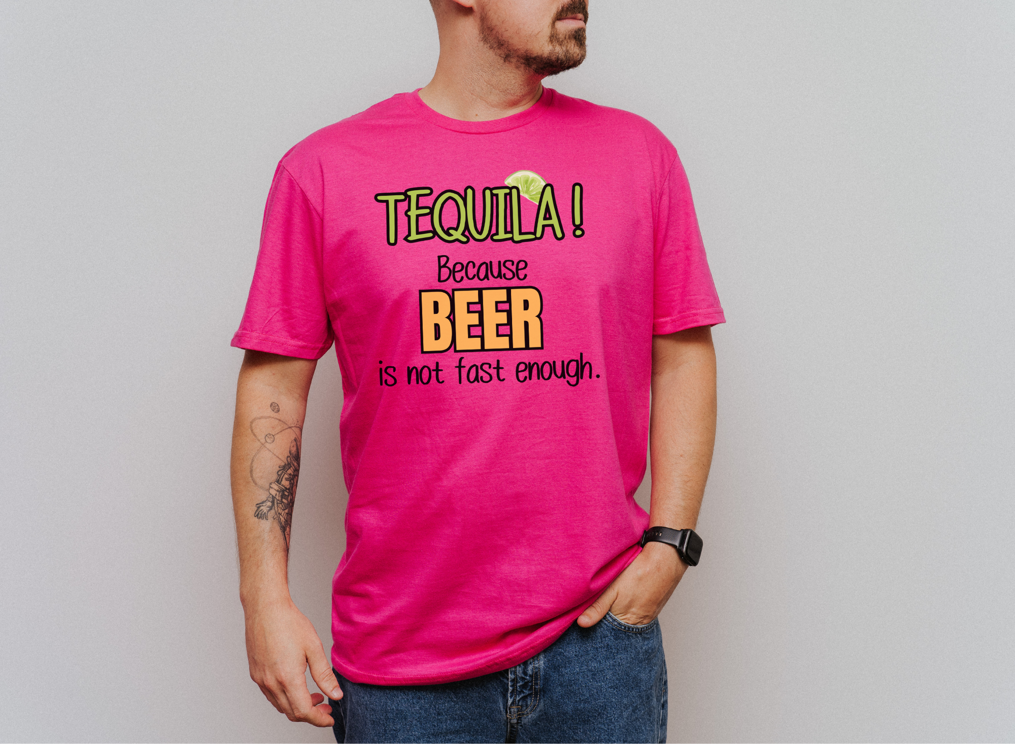 Pink unisex T-shirt with "TEQUILA! Because Beer is not Fast Enough" slogan and lime graphic.
