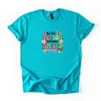 Be The Reason Someone Smiles uplifting SoftStyle shirt with positive message and stylish design