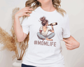 #MomLife wine shirt featuring graphic of mom with wine bottle, perfect gift for moms.