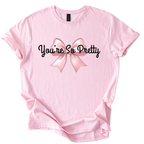Pink Gildan Softstyle shirt with "You're So Pretty" text and pink bow design, unisex sarcastic tee