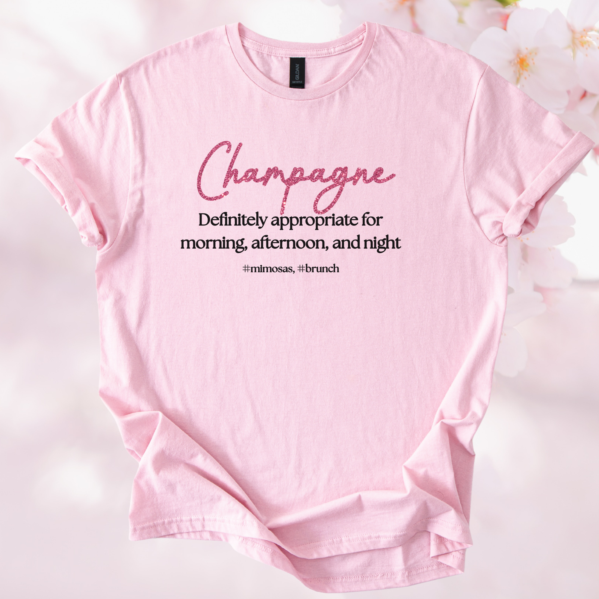 Pink Champagne Brunch softstyle cotton t-shirt with text "Champagne Definitely appropriate for morning, afternoon, and night" for brunch lovers