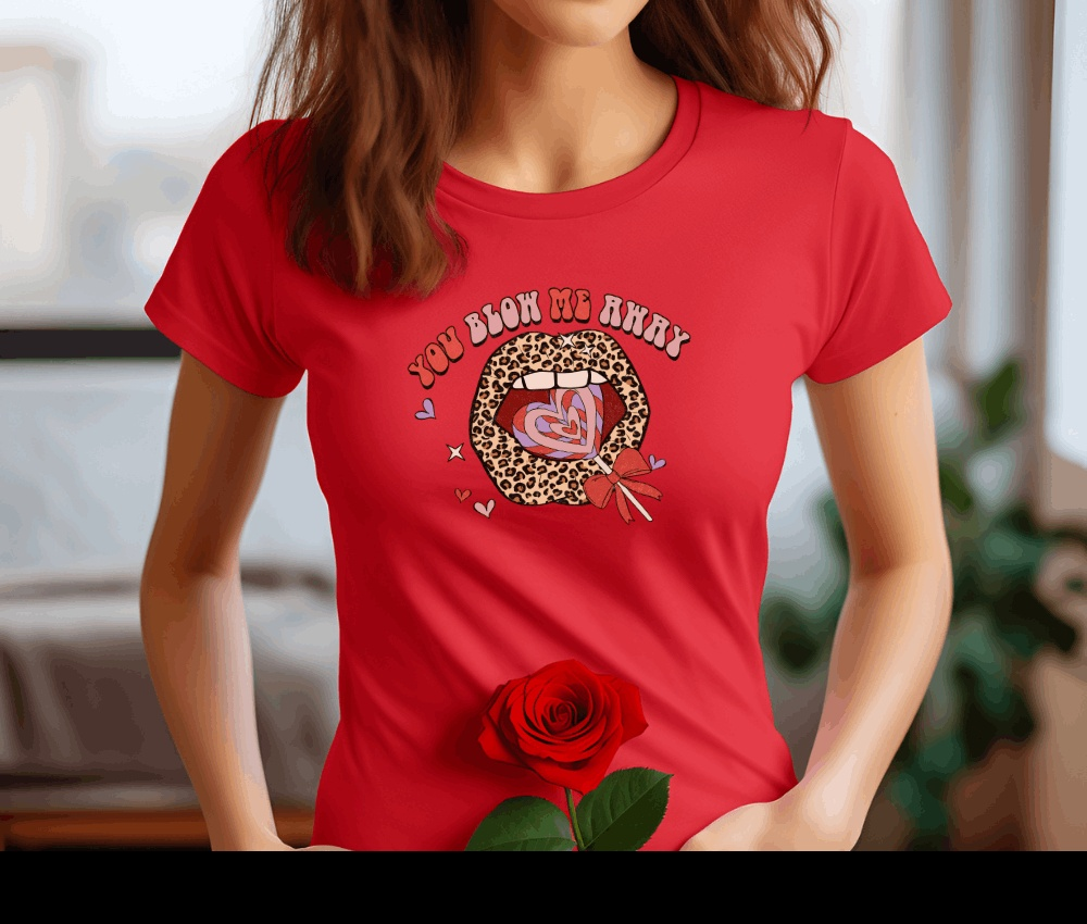 Valentine's Day t-shirt with "You Blow Me Away" design, female model holding a rose.