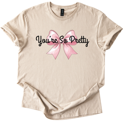 You're So Pretty beige softstyle t-shirt with pink bow and sarcastic text design