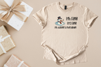 Beige unisex softstyle shirt with a melting snowman and "I'm Fine It's Fine I'm having a meltdown" text, holiday humor tee
