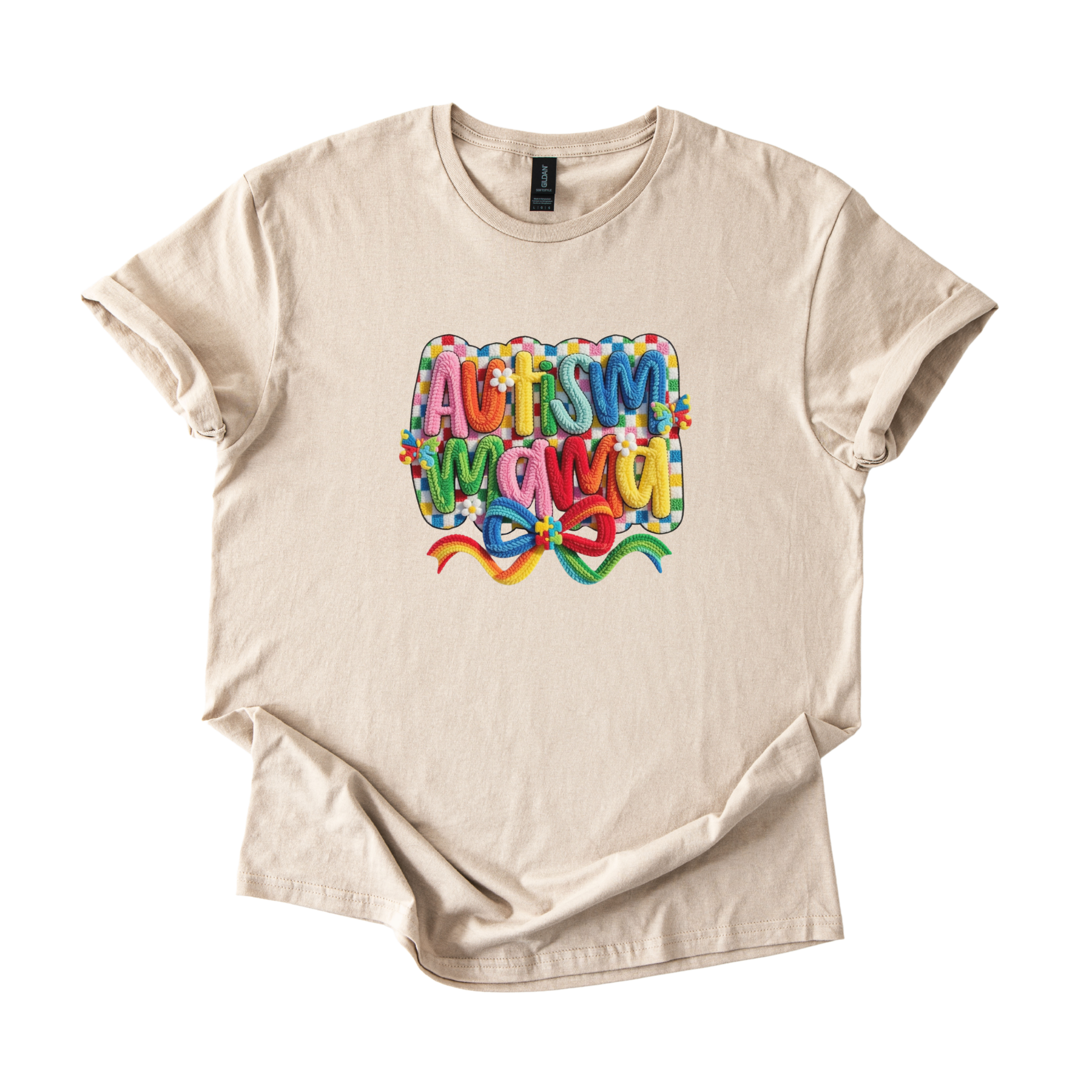 White tee with Autism Mama Rainbow crochet-style yarn lettering and colorful floral accents