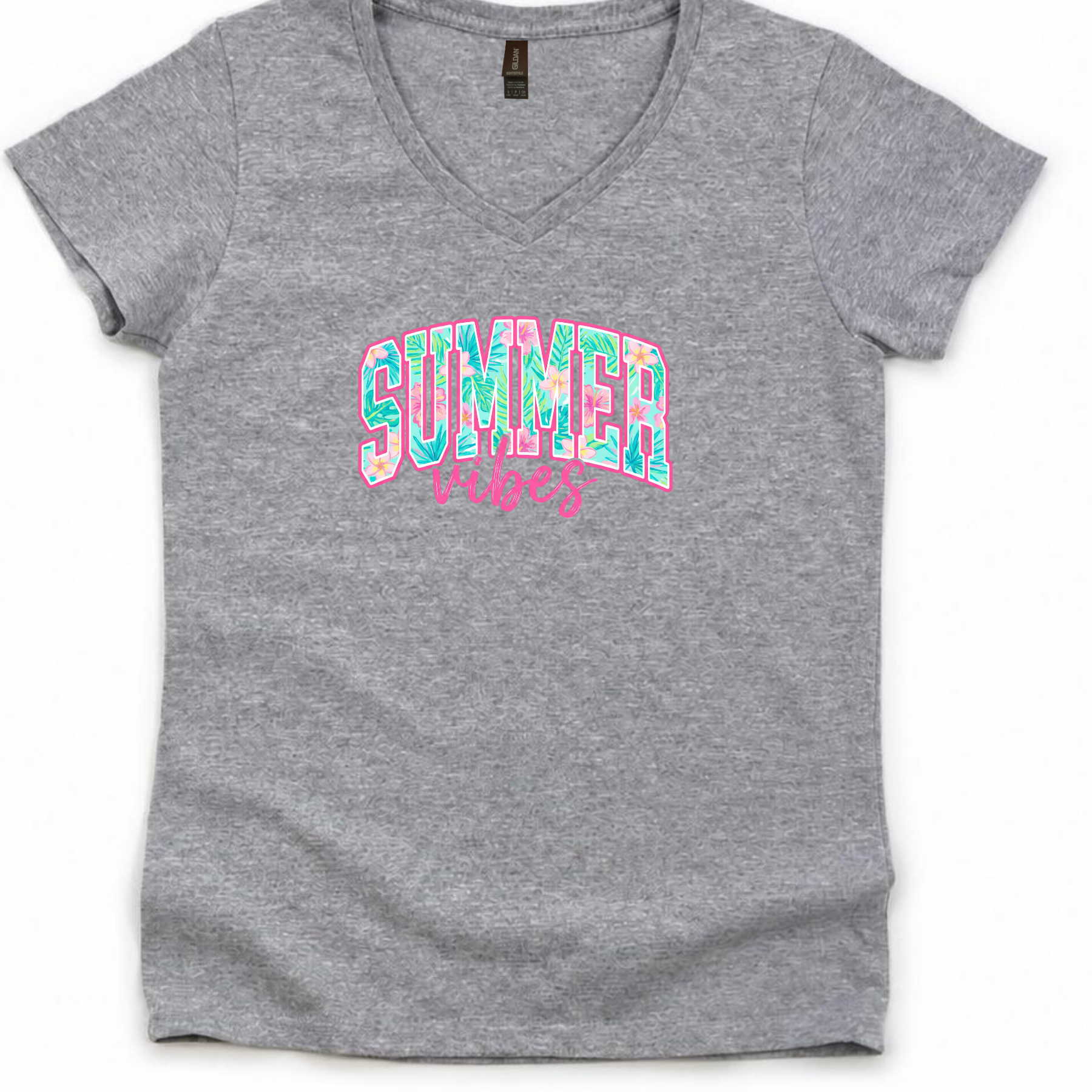 Gildan Women’s Softstyle V-Neck T-Shirt with tropical summer vibes graphic and pink beach accents