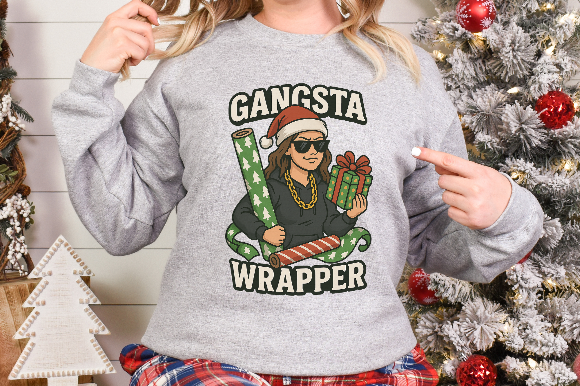 Woman wearing gray Gangsta Wrapper holiday sweatshirt with Christmas gift wrapping design