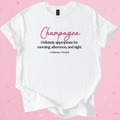 White Gildan Softstyle T-shirt with pink text "Champagne" and black slogan "Definitely appropriate for morning, afternoon, and night" promoting Champagne Brunch style