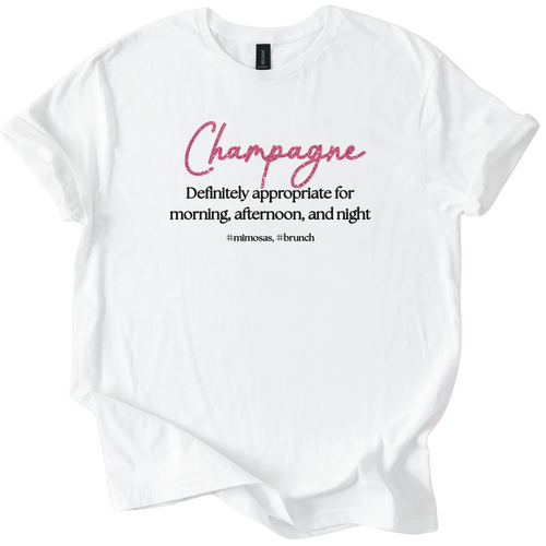 White Gildan Softstyle T-shirt with pink text "Champagne" and black slogan "Definitely appropriate for morning, afternoon, and night" promoting Champagne Brunch style