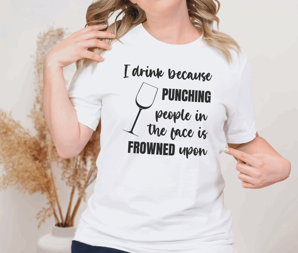 Funny unisex T-shirt with "I Drink Because Punching People in the Face is Frowned Upon" slogan.